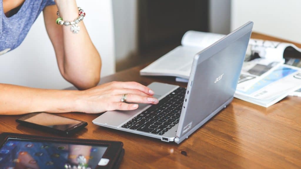 Female editor at work on laptop