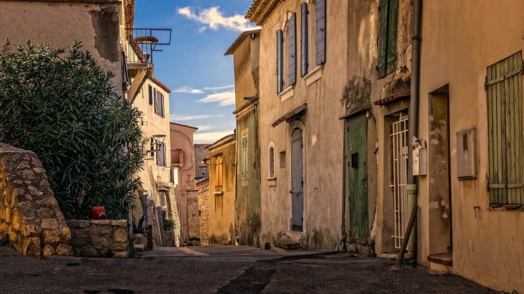 French street with shuttered buildings