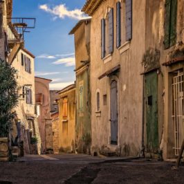 French street with shuttered buildings