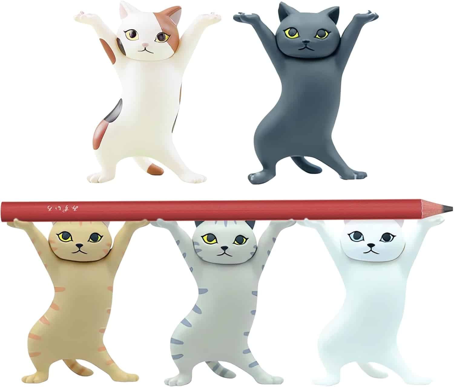 Five different coloured cat figures standing on their hind legs, with front paws in the air, holding a pencil