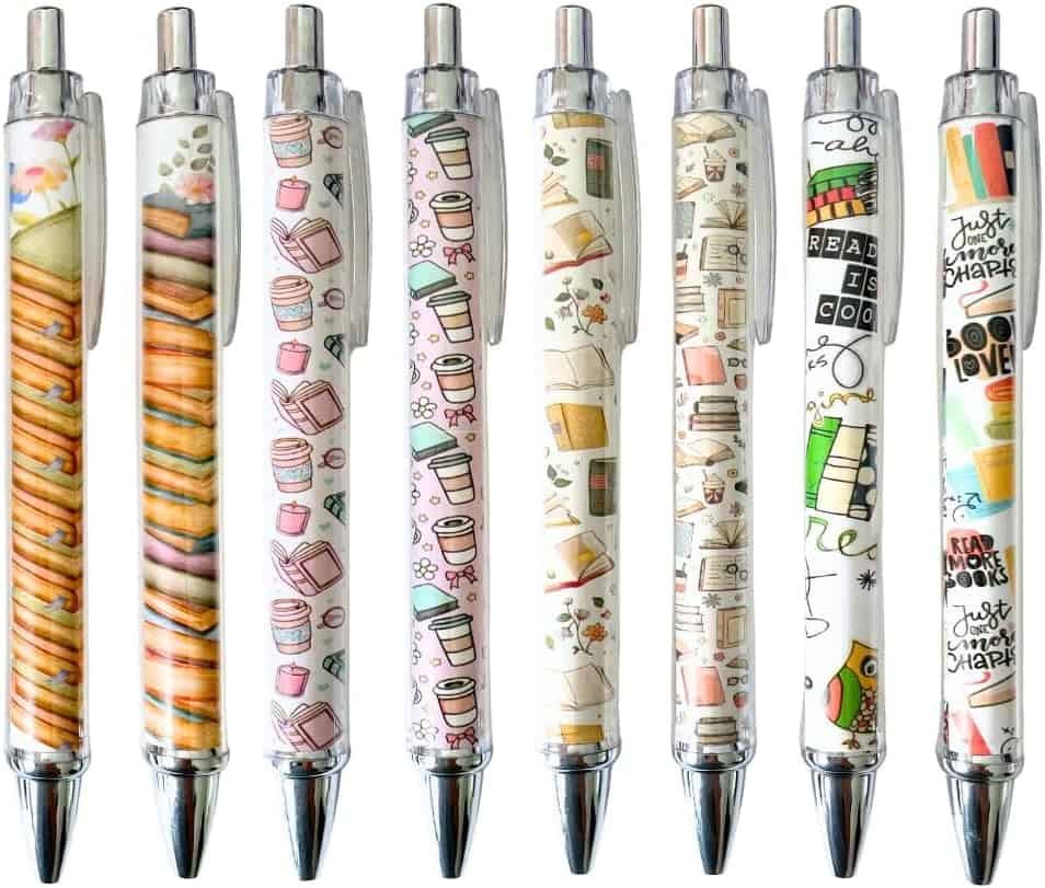 Eight ballpoint pens decorated with book designs